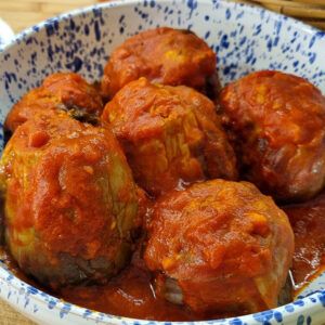 Melanzane ammuttunate con salsiccia e tuma